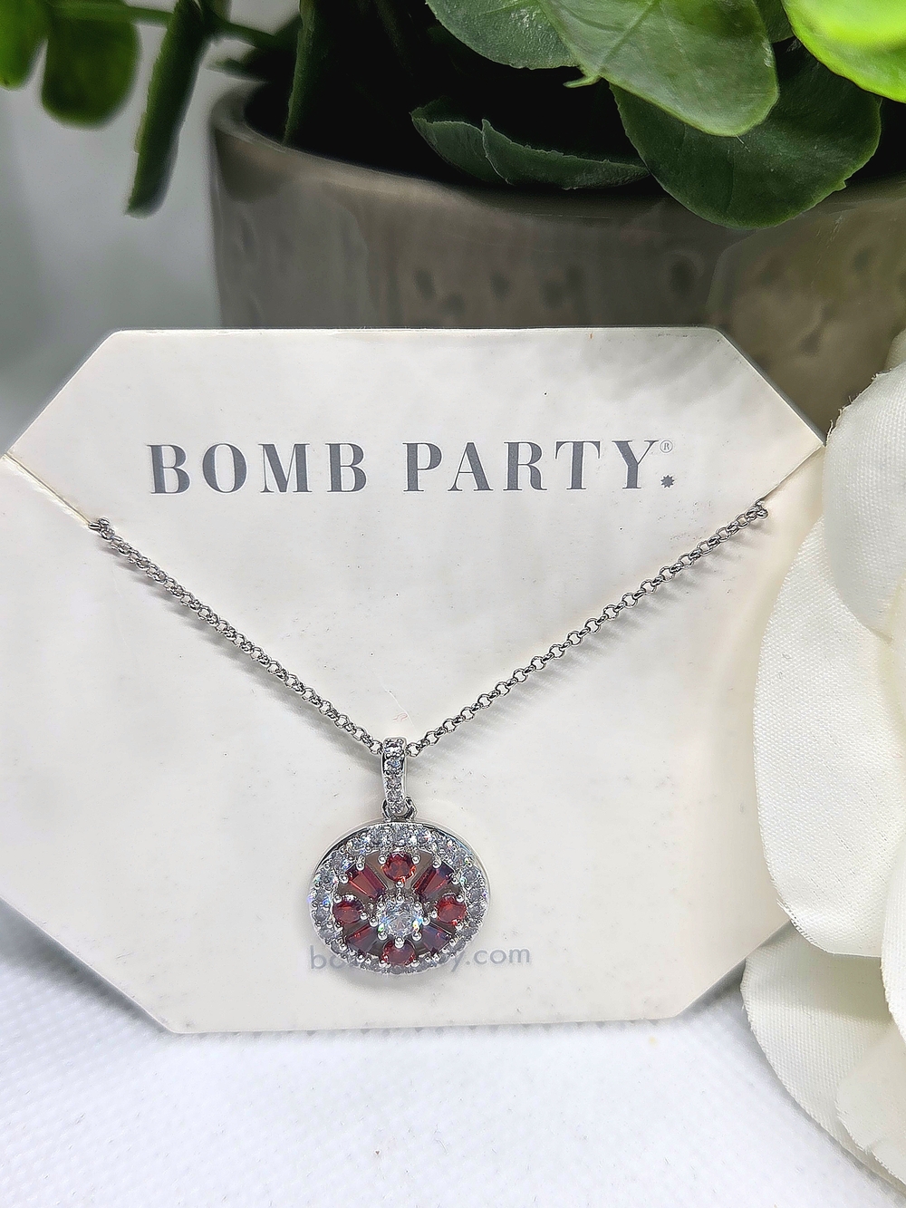 BP Necklace with Garnet CZ and Clear Accent Stones On Rhodium Plating